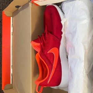 Orange and red sneakers